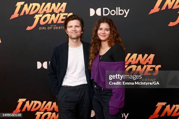 Adam Scott and Frankie Scott attend the Los Angeles Premiere of LucasFilms' "Indiana Jones And The Dial Of Destiny" at Dolby Theatre on June 14, 2023...