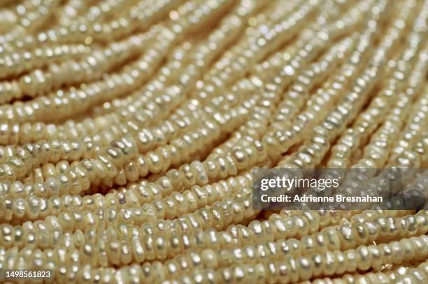 strands of freshwater pearls at beijing’s hong qiao pearl market - oyster pearl stockfoto's en -beelden