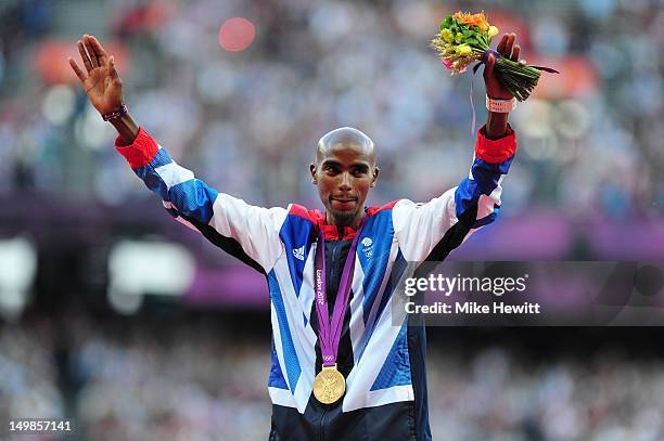 Gold medalist Mohamed Farah of Great Britain poses on the podium for Men's 10,000m on Day 9 of the London 2012 Olympic Games at the Olympic Stadium...