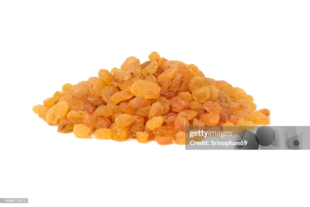 Dried raisins on white background