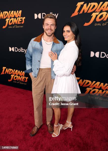 Derek Hough and Hayley Erbert attends the Indiana Jones and the Dial of Destiny U.S. Premiere at the Dolby Theatre in Hollywood, California on June...