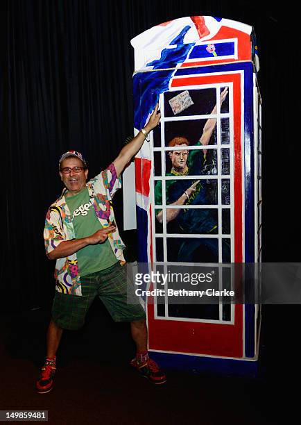 British TV personality Timmy Mallett poses next to his 'Ring-a Royal-Phonebox' part of the BT ArtBox Project that was made to celebrate the 25th...