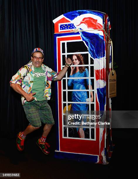 British TV personality Timmy Mallett poses next to his 'Ring-a Royal-Phonebox' part of the BT ArtBox Project that was made to celebrate the 25th...