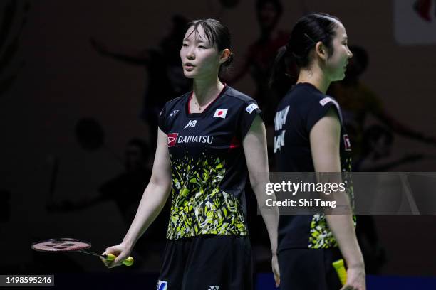 Mayu Matsumoto and Wakana Nagahara of Japan react in the Women's Doubles Second Round match against Benyapa Aimsaard and Nuntakarn Aimsaard of...