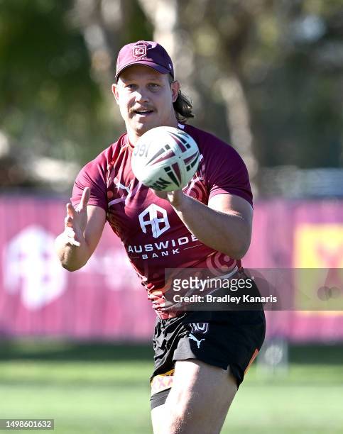 Reuben Cotter catches the ball during a Queensland Maroons State of Origin training session at Sanctuary Cove on June 15, 2023 in Gold Coast,...
