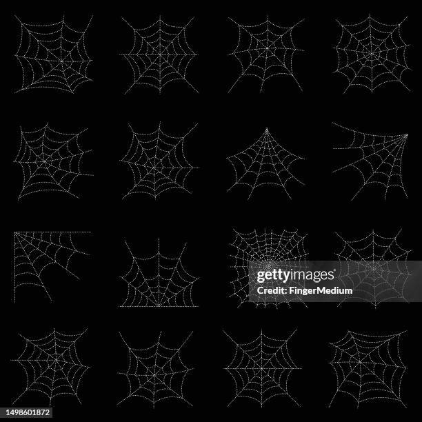 spider web set isolated on dark background - spider web stock illustrations