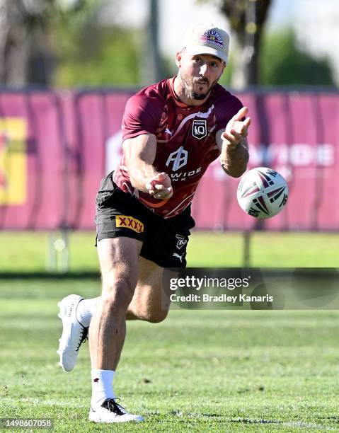 Ben Hunt passes the ball during a Queensland Maroons State of Origin training session at Sanctuary Cove on June 15, 2023 in Gold Coast, Australia.