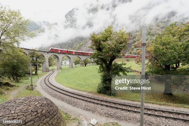famous 360 degrees, circular train viaduct at brusio - brusio grisons stock pictures, royalty-free photos & images