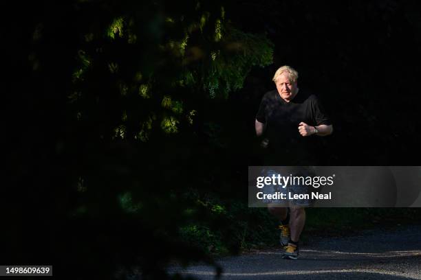 Former British Prime Minister Boris Johnson is seen on his morning run on June 15, 2023 in Brightwell-cum-Sotwell, England. The Privileges Committee...