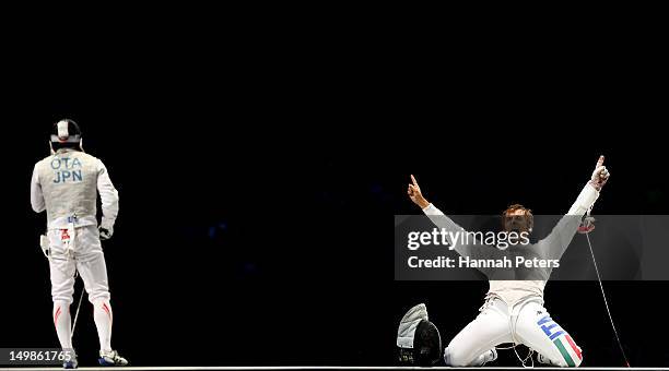 Andrea Baldini of Italy celebrates defeating Yuki Ota of Japan to win the gold medal match 45-39 in the Men's Foil Team Fencing finals on Day 9 of...