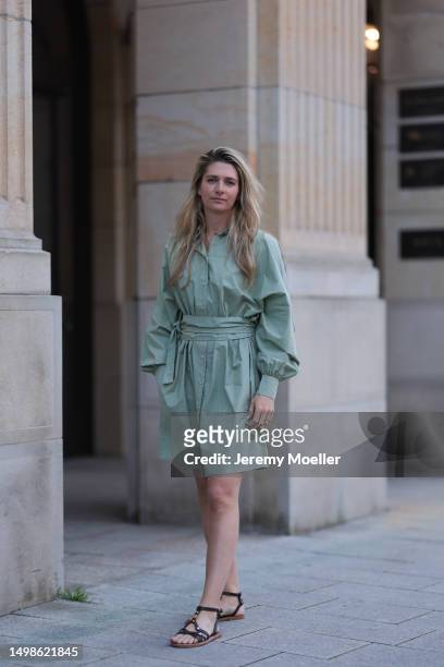Josephine Kröger wearing mint colored knee length long sleeve SoSue dress and black open Celine sandal with straps on June 08, 2023 in Hamburg,...