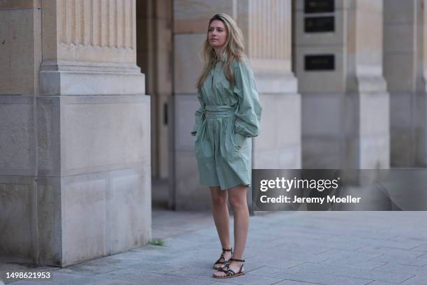 Josephine Kröger wearing mint colored knee length long sleeve SoSue dress and black open Celine sandal with straps on June 08, 2023 in Hamburg,...