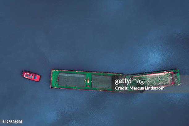 tugboat with barges on the river - tug barge stock pictures, royalty-free photos & images