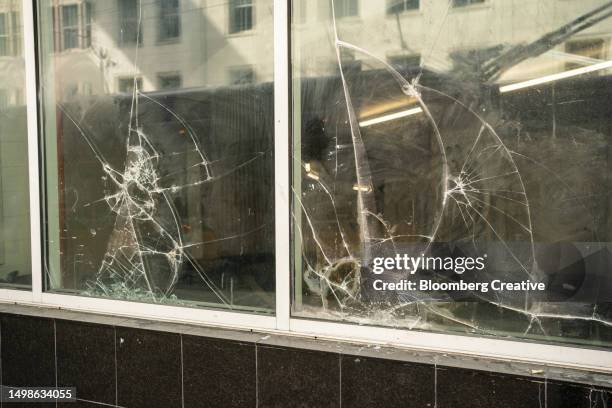 broken windows - riot stock pictures, royalty-free photos & images