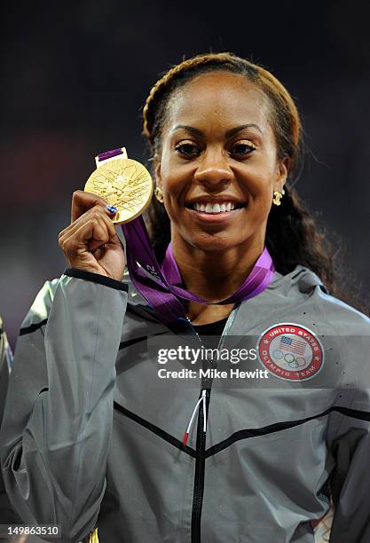 Gold medalist Sanya Richards-Ross of the United States poses on the podium during the medal ceremony for the Women's 400m Final on Day 9 of the...