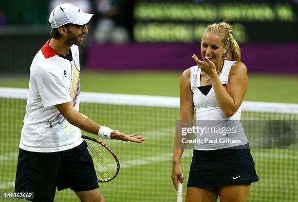 Sabine Lisicki of Germany and Christopher Kas of Germany react during the Mixed Doubles Tennis bronze medal match against as Lisa Raymond of the...