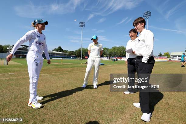 England A Captain, Lauren Winfield Hill tosses the coin with Australia Captain Alyssa Healy looking on during the England A Women and Australia Women...