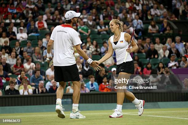 Sabine Lisicki of Germany and Christopher Kas of Germany react during the Mixed Doubles Tennis bronze medal match against as Lisa Raymond of the...