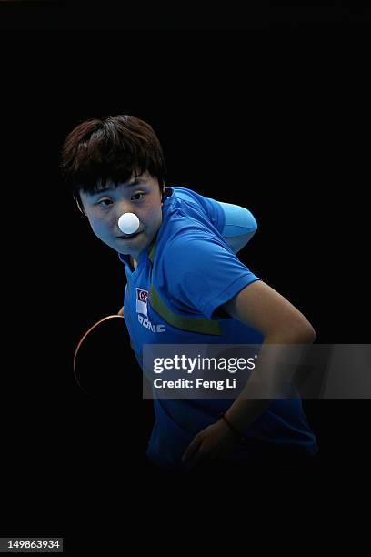 Tianwei Feng of Singapore competes during Women's Team Table Tennis semifinal match against team of Japan on Day 9 of the London 2012 Olympic Games...