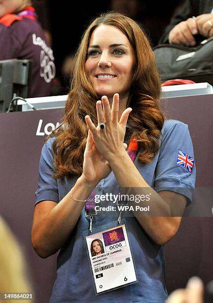 Catherine, Duchess of Cambridge applauds during the Women's Handball Preliminaries Group A match between Great Britain and Croatia on Day 9 of the...