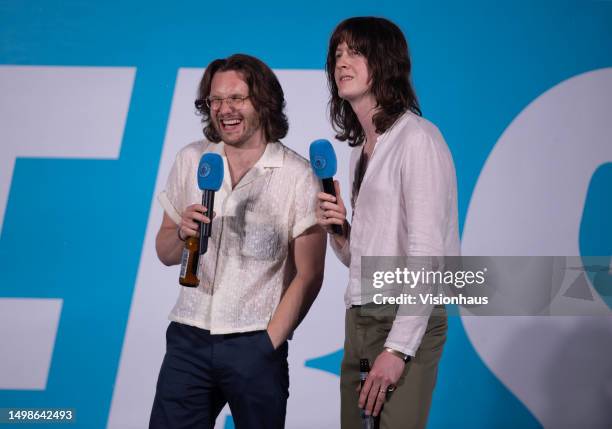 Blossoms band members Tom Ogden and Joe Donovan on stage in St Peter's Square during the Manchester City trophy parade on June 12, 2023 in...