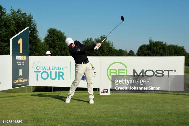 Paul Dunne of Ireland hits off the first tee during Day One of the Kaskáda Golf Challenge 2023 at Kaskáda Golf Resort on June 15, 2023 in Kácov,...