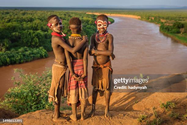 young boys from karo tribe, ethiopia, africa - african tribal face painting 個照片及圖片檔