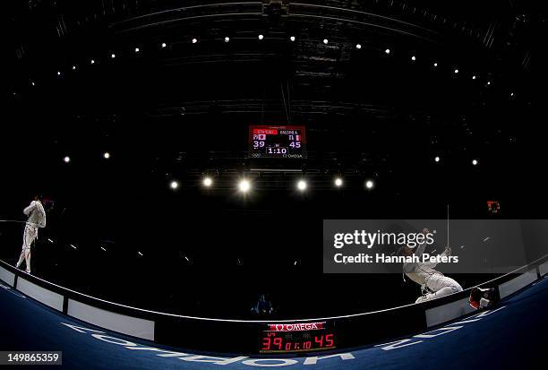 Andrea Baldini of Italy celebrates defeating Yuki Ota of Japan to win the gold medal match 45-39 in the Men's Foil Team Fencing finals on Day 9 of...