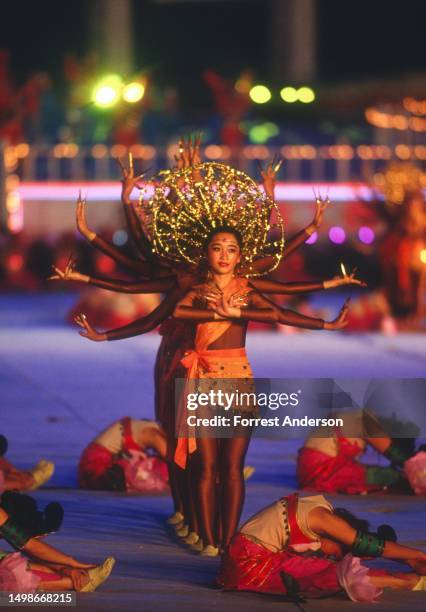 View of performers during the opening ceremony of the Asian Games of Workers' Stadium, Beijing, China, September 19, 1990. They are imitating...