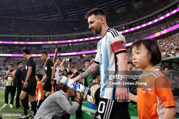Lionel Messi of Argentina walks into the pitch prior to the international friendly match between Argentina and Australia at Workers Stadium on June...