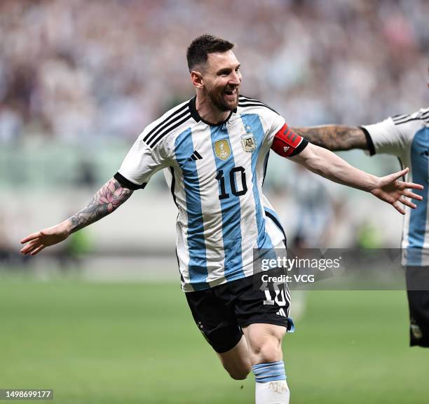 Lionel Messi of Argentina celebrates after scoring his team's first goal during the international friendly match between Argentina and Australia at...