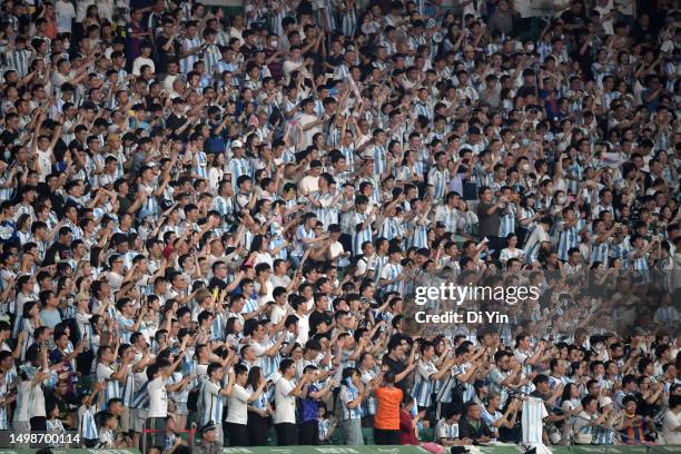 Chinese fans of Argentina cheer during the international friendly match between Argentina and Australia at Workers Stadium on June 15, 2023 in...