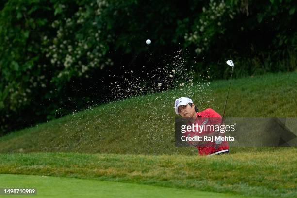 Haru Nomura of Japan plays a shot from a bunker on the 15th hole during the first round of the Meijer LPGA Classic for Simply Give at Blythefield...