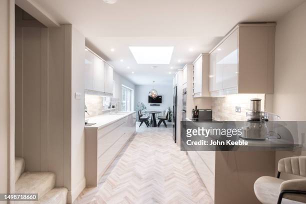 property interiors - narrow kitchen stock pictures, royalty-free photos & images