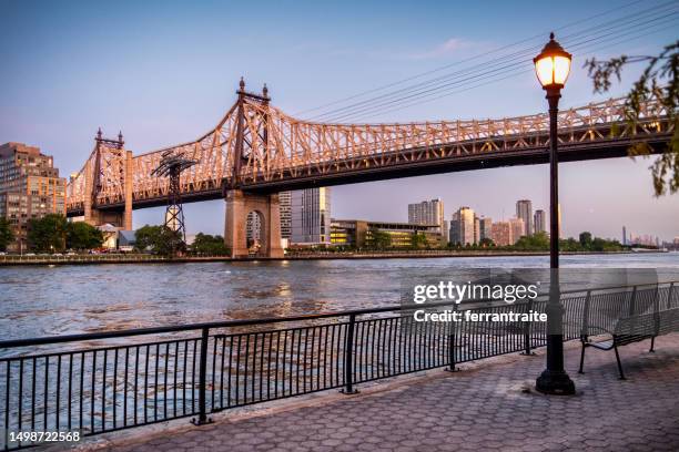 east river greenway new york city - queensboro bridge stock pictures, royalty-free photos & images