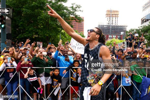 Aaron Gordon waves to the crowd during the Denver Nuggets victory parade and rally after winning the 2023 NBA Championship on June 15, 2023 in...