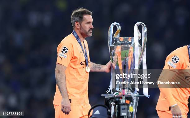 Scott Carson of Manchester City with the UEFA Champions League trophy after the UEFA Champions League 2022/23 final match between FC Internazionale...