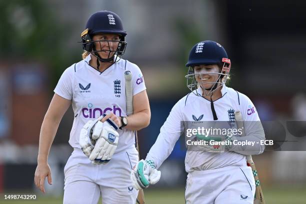Tammy Beaumont and Heather Knight of England leave the field at stumps during the tour game between England Women and Australia A Women at The Incora...