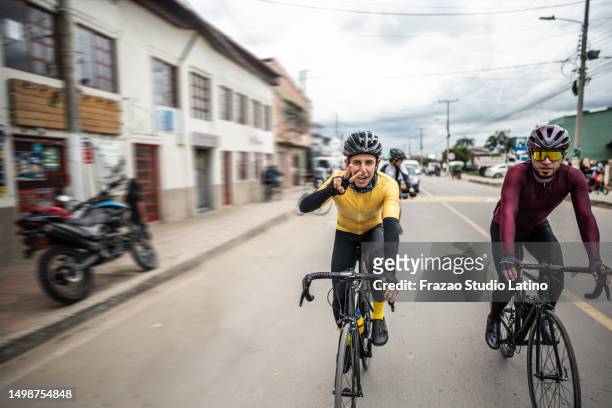 portrait of cyclist men cycling on the city - cycling vest stock pictures, royalty-free photos & images