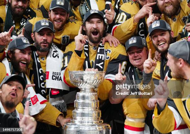 The Vegas Golden Knights celebrate with the Stanley Cup after a 9-3 victory against the Florida Panthers in Game Five of the 2023 NHL Stanley Cup...