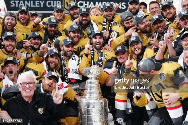 The Vegas Golden Knights celebrate with the Stanley Cup after a 9-3 victory against the Florida Panthers in Game Five of the 2023 NHL Stanley Cup...