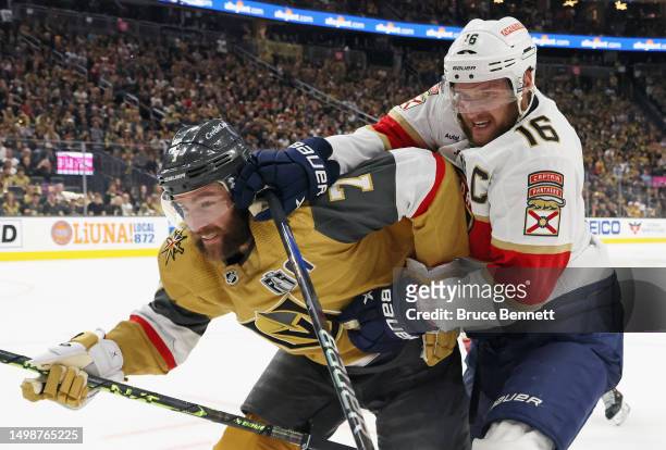 Alex Pietrangelo of the Vegas Golden Knights defends against Aleksander Barkov of the Florida Panthers in Game Five of the 2023 NHL Stanley Cup Final...