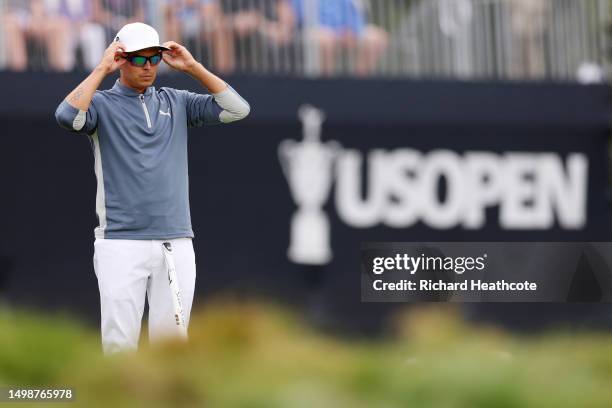 Rickie Fowler of the United States waits to putt on the sixth green during the first round of the 123rd U.S. Open Championship at The Los Angeles...