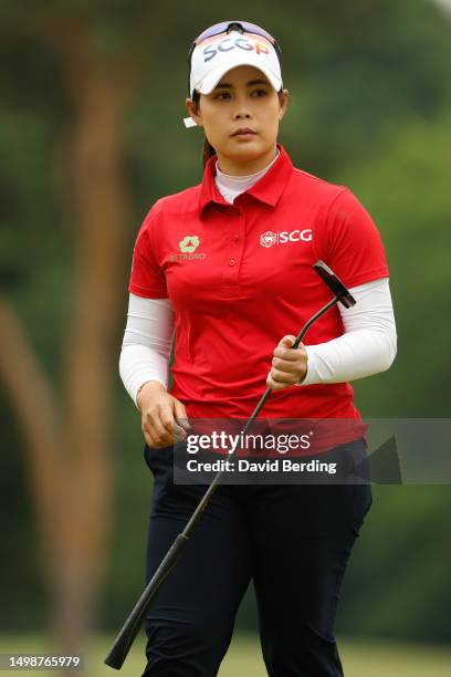 Moriya Jutanugarn of Thailand walks the first green during the first round of the Meijer LPGA Classic for Simply Give at Blythefield Country Club on...