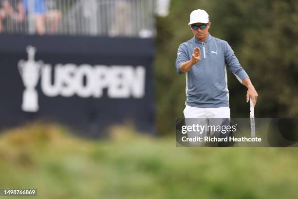 Rickie Fowler of the United States lines up a putt on the sixth green during the first round of the 123rd U.S. Open Championship at The Los Angeles...