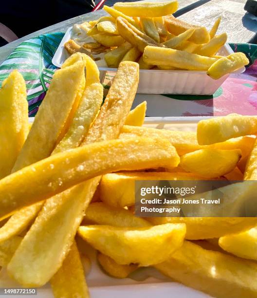 two portions of chips in trays - concession stand fries stock pictures, royalty-free photos & images