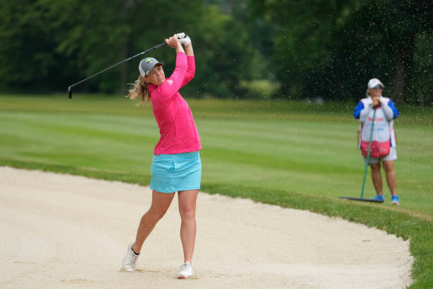 Amy Olson of the United States plays a shot from a bunker on the 14th hole during the first round of the Meijer LPGA Classic for Simply Give at...