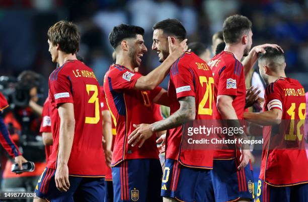 Marco Asensio and Joselu of Spain celebrate after the team's victory in the UEFA Nations League 2022/23 semi-final match between Spain and Italy at...