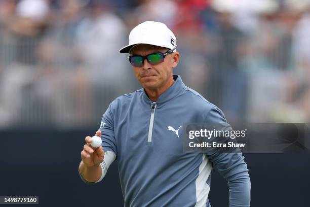 Rickie Fowler of the United States reacts to his putt on the ninth green during the first round of the 123rd U.S. Open Championship at The Los...