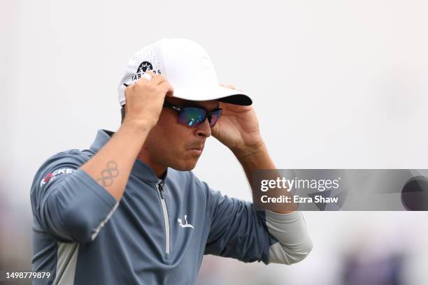 Rickie Fowler of the United States walks from the course after his round during the first round of the 123rd U.S. Open Championship at The Los...